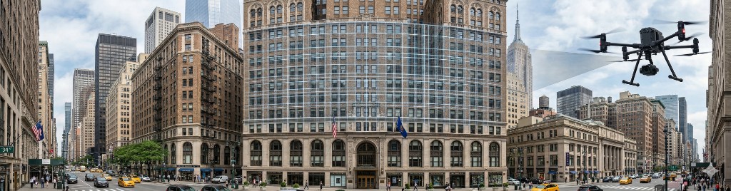 Drone scanning a historic urban building facade with a digital grid overlay on the stone exterior