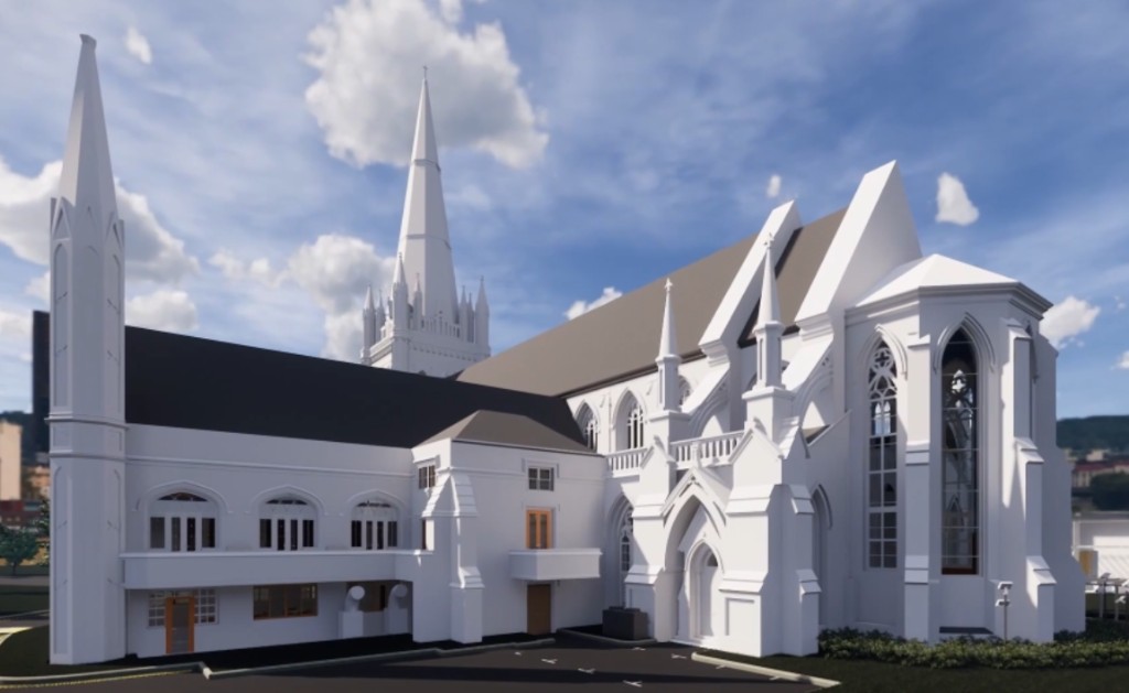 White 3D model of a Gothic cathedral with spires and arched windows against a blue sky